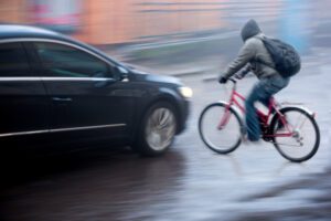Moments before a bicycle and a car driven by a careless driver collide. A bicycle accident lawyer in San Diego will help you file an insurance claim or personal injury lawsuit.