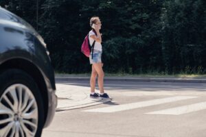 Moments before a schoolgirl crosses the street is hit by a speeding driver. A pedestrian accident lawyer in San Diego will help injured victims hold the driver accountable.